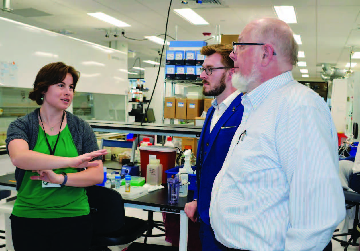Amber Gilbert (left) discusses synthetic biology and biotechnology with Ginkgo Bioworks foundry team during Air Force Research Laboratory
“bluing” trip, April 24, 2018, in Boston, Massachusetts (U.S. Air Force/Marisa Novobilski)